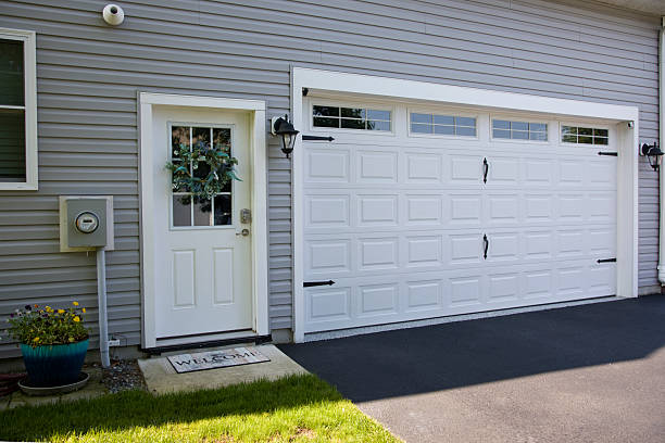 24/7 Emergency Garage Door Panel Replacement experts in Blue Jay, OH